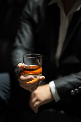  Barman pouring whiskey whiskey glass celebrate whiskey on a friendly party in  restaurant