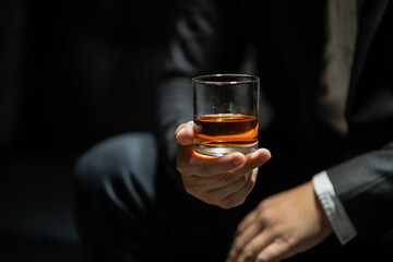  Barman pouring whiskey whiskey glass celebrate whiskey on a friendly party in  restaurant