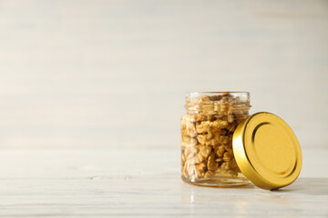 Concept of tasty and sweet food - honey with nuts