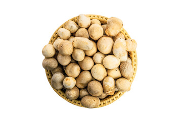 Obraz premium Straw mushrooms in straw basket isolated on white background.