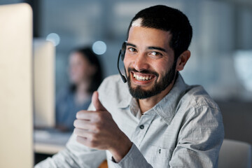 Call center, portrait and man with thumbs up for customer service, sales target and CRM success in...