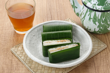 Lemper Ayam, Indonesian snack made of glutinous rice filled with seasoned shredded chicken or beef...