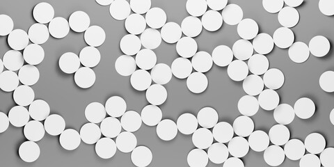 Abstract white round circular objects on gray background, flat lay view from above, 3D circles in random order