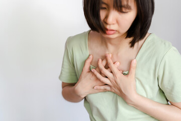 Women experience chest congestion due to suffocation. Health care concept.