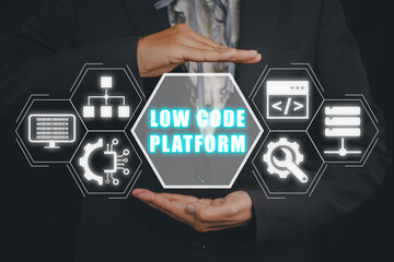 Low Code software development platform technology concept, Woman hand holding Low Code software development platform icon on virtual screen.