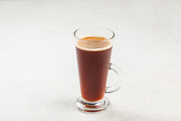 Glass mug of hot black americano coffee