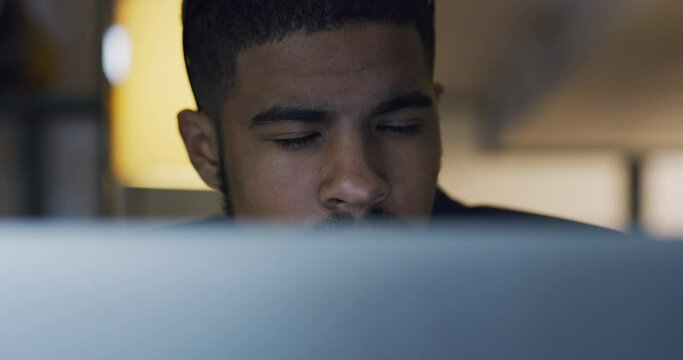Business, computer and black man reading, writer or focus on project at night. Desktop, concentration and African male professional read email, information or copywriting report for office deadline.