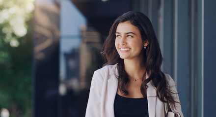 Happy, corporate and business woman in city for mockup space, professional or happiness. Commute, modern and natural with female employee thinking in urban outdoor for motivation, confident and pride