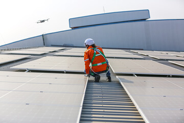 professional technician or engineer installing solar panels, Alternative energy for installed solar panels in use on roof of home