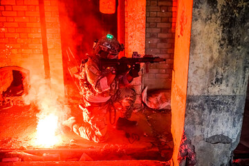 Infantry soldier shooting during military combat training.. Army elite troops marksman, special...