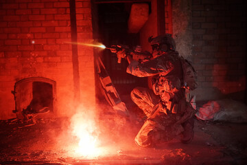 Infantry soldier shooting during military combat training.. Army elite troops marksman, special...