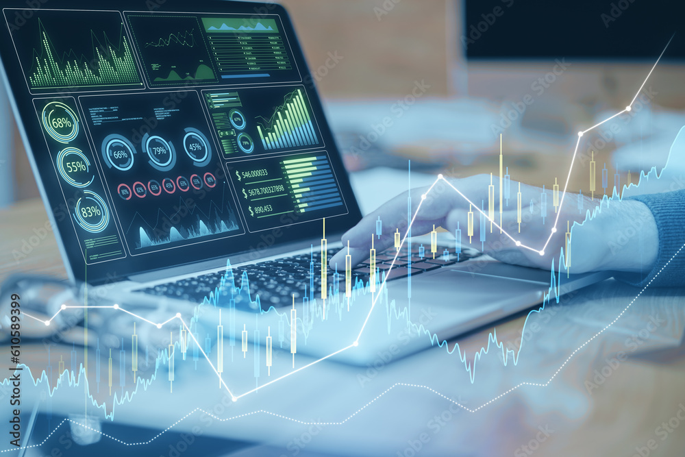 Poster close up of male hand using laptop computer at workplace with glowing candlestick forex chart on blu