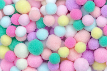 Pastel balls or pom pom balls made of fabric