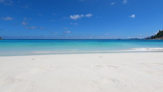 Paradise beach on Seychelles - petite anse - turquoise lagoon - Coastal landscape on the white sand of a tropical beach