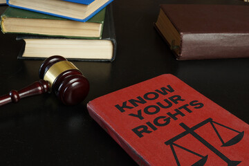 Know your rights is shown using the text on the book and photo of the gavel