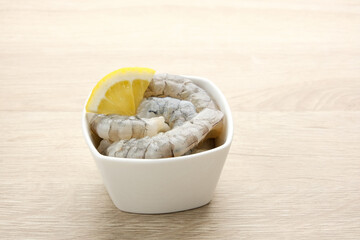 Fresh peeled shrimps (udang kupas), food preparation.
