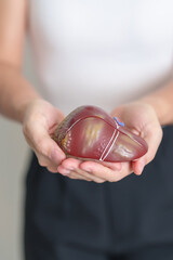 Woman holding human Liver anatomy model. Liver cancer and Tumor, Jaundice, Viral Hepatitis A, B, C, D, E, Cirrhosis, Failure, Enlarged, Hepatic Encephalopathy, Ascites Fluid in Belly and health