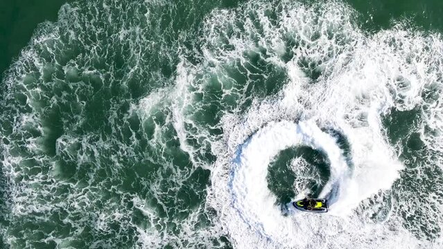 Video of Jet ski Sea doo doing donuts on the sea