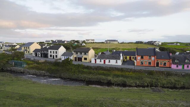 Colorful house along Irish river in Doolin Ireland