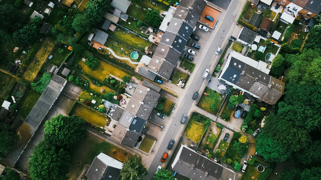 Scenic landscape from above aerial view of houses in small town in countryside Germany .