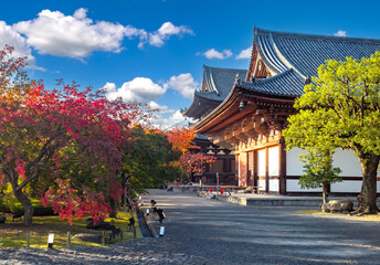 Landmarks Japan. Architecture of Kyoto. Ancient buildings in buddhist style. Japanese temples with blue sky. National landmarks of Japan. Kyoto in sunny weather. Excursions in Kyoto. Travel in Japan - obrazy, fototapety, plakaty