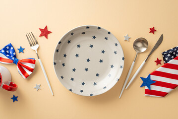 Fourth of July menu setup: overhead view of table featuring plate, cutlery, cup, glitter stars,...