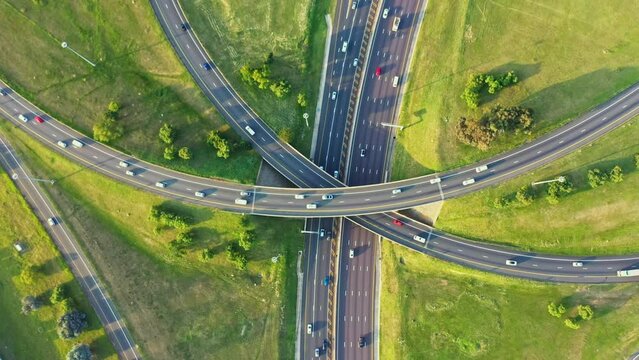 Highway, traffic drone and fast cars with travel and road in urban area with aerial. Journey, driving and city freeway traveling outdoor with speed and transportation in car on street with vehicle
