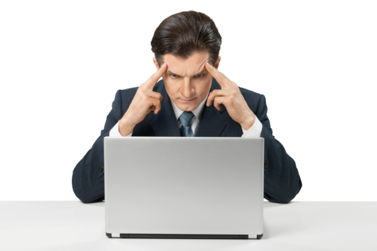 Business man working on laptop and thinking