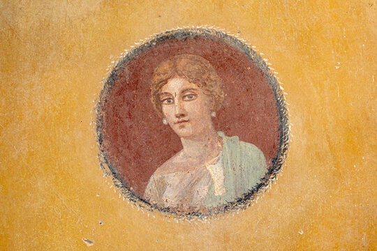 Detail of fresco in the recently escavated House with Garden (Regio V) portraing  a woman, Pompei archeological site, Naples, Italy