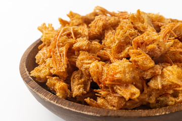 Fried shrimp head snack on white background