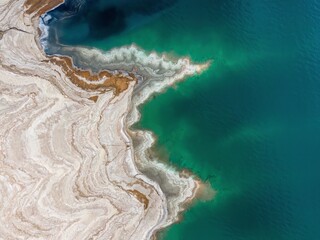 Aerial view of dead sea coast, minerals, salt in nature, Ein Gedi, Israel