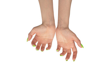 Hand of a woman with green naols hold some tiny or thin object.