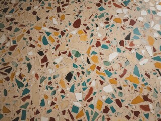 Top-Ansicht einer Nahaufnahme eines Terrazzo-Bodens: Mosaikartige Muster, vielfältige Farben und Texturen