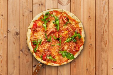 Tasty fresh pizza dish on desk