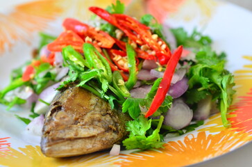 The fried salted mackerel with coriander and red pepper set for meal.