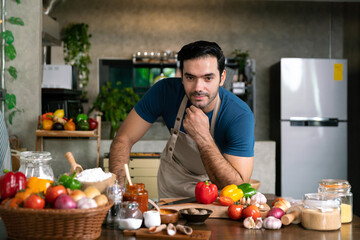 professional male chef prepare fresh ingredient for cook deliciuos healthy meal for breakfast and dinner with homemade cheese pizza flour and dough in kitchen