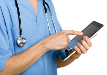 Doctor with stethoscope working on digital table