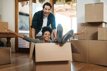 Happy couple, box and real estate in new home or property for renovation and investment together....