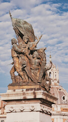 Obraz premium Sculptural group L' Azione by Francesco Jerace and the Palazzo delle Assicurazioni Generali, Rome, Italy