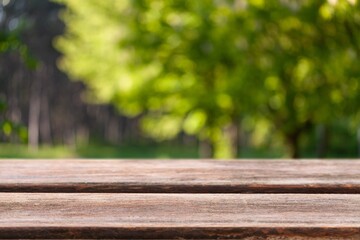 Fototapeta premium Wooden blank desk on nature landscape