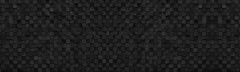 Old black stone brick wall wide panoramic texture. Rough masonry dark grunge large background