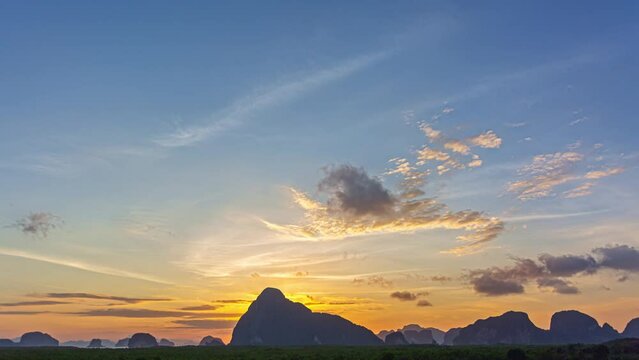 .4K Time lapse of Majestic sunset or sunrise landscape..fantasy cloud scape in sunrise above Samed Nang Chee viewpoint..Natural archipelago landscape background..Glare from the sun over the islands..
