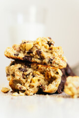 Detail shot of a delicious broken cookie with chocolate inside.