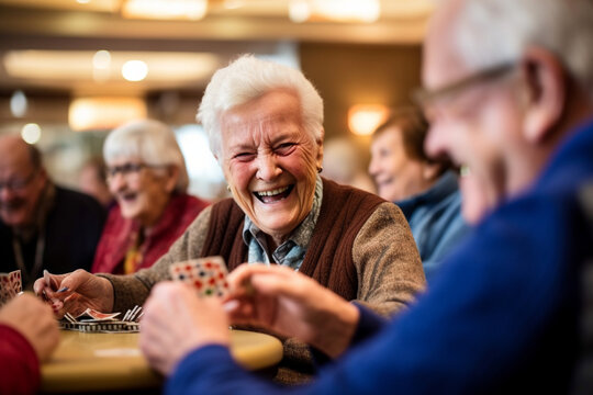 A group of elderly individuals engaging in a friendly game of cards, their laughter and camaraderie filling the room, elderly happy people, old age, bokeh Generative AI