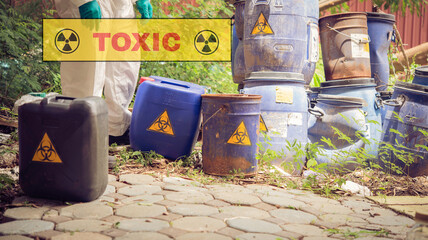 Asian scientist wear Chemical protection suit check danger chemical,working at dangerous...