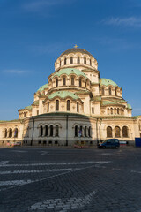 Fototapeta na wymiar Alexander Nevski Cathedral in the city of Sofia in Bulgaria, with the light of dawn on a day with clear skies.