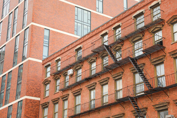 Old brick buildings symbolize timeless elegance, heritage, stability, and a sense of history in the business office environment
