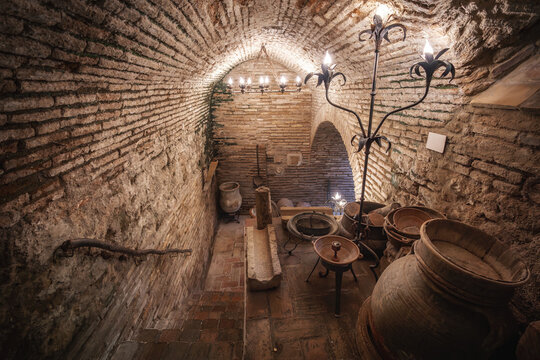 Casa Andalusi (House of Andalusia) Basement with old jars and instruments - Cordoba, Andalusia, Spain