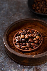 Coffee beans roasted in a wooden bowl
