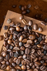 Roasted coffee beans in a wooden box from above view